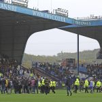 Sheffield Wednesday fans enter pitch to protest against club ownership