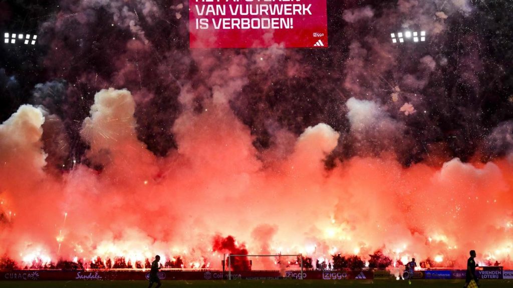 Ajax condemns fireworks at stadium after match gets abandoned