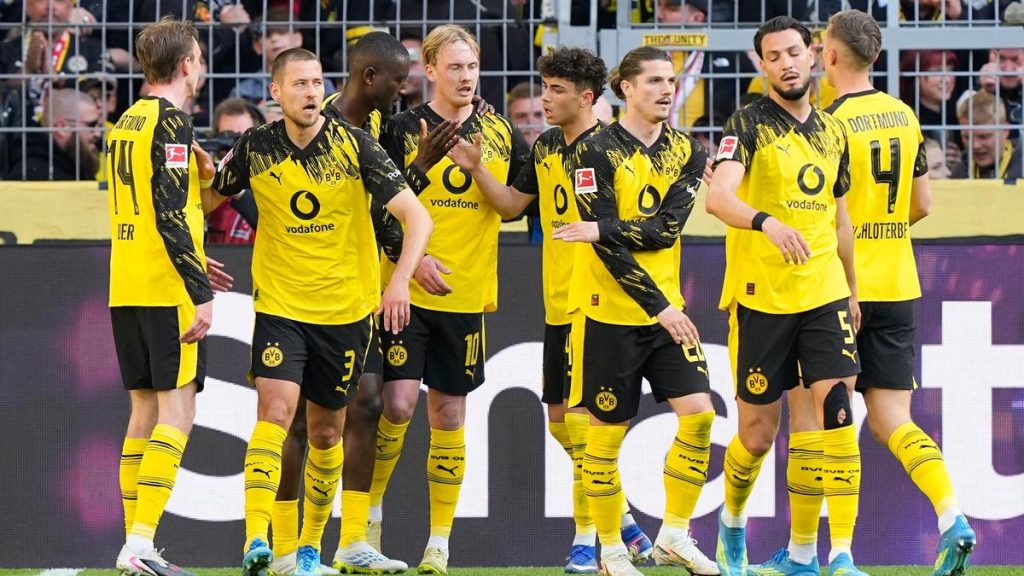 Dortmund secures Champions League qualification with a 4-0 victory over Freiburg